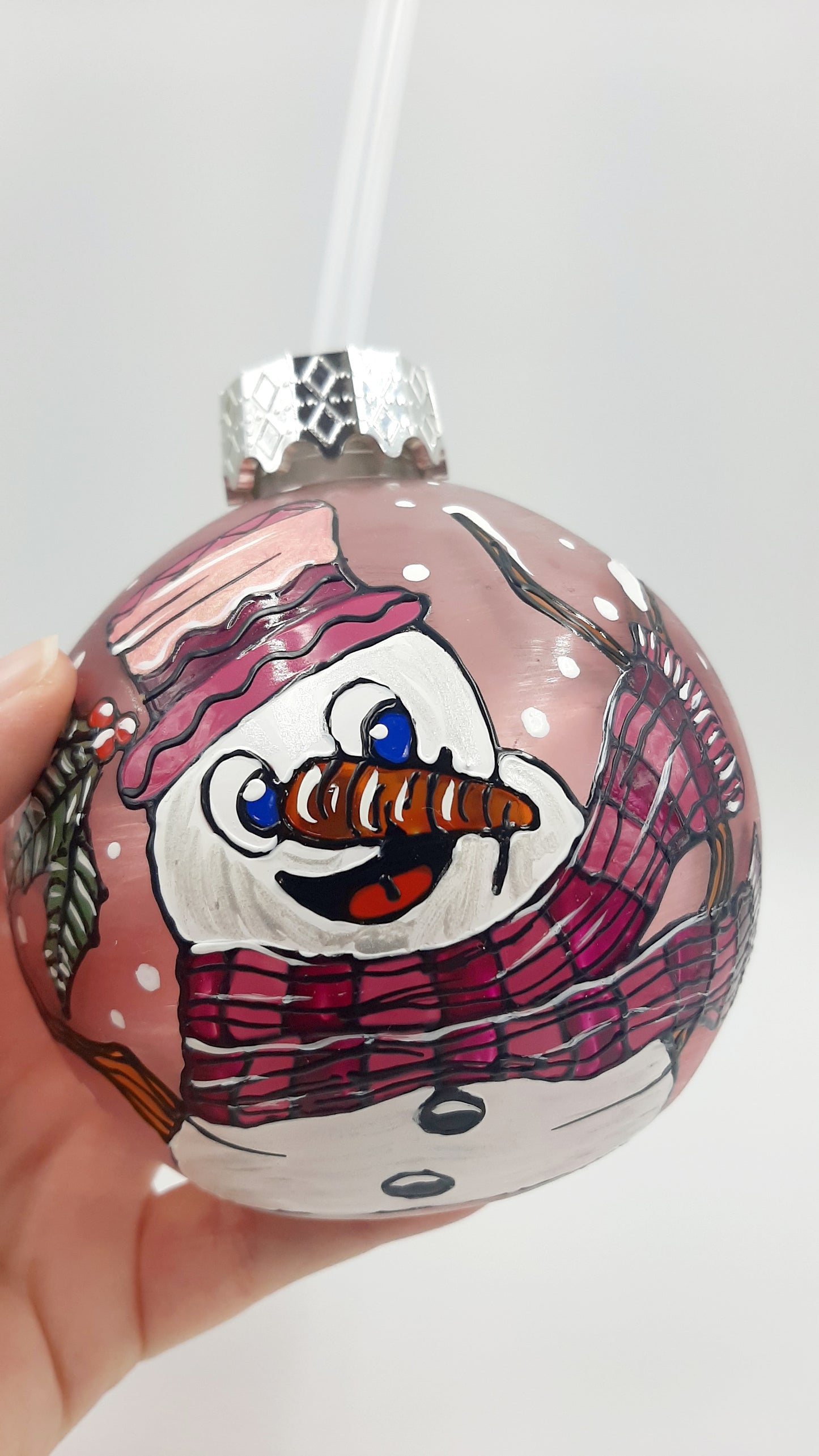 Boule cocktail bonhomme de neige sur fond rose