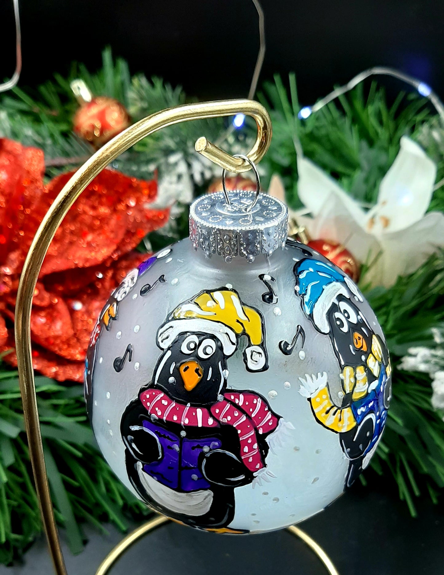 Boule de Noël chorale de pingouins