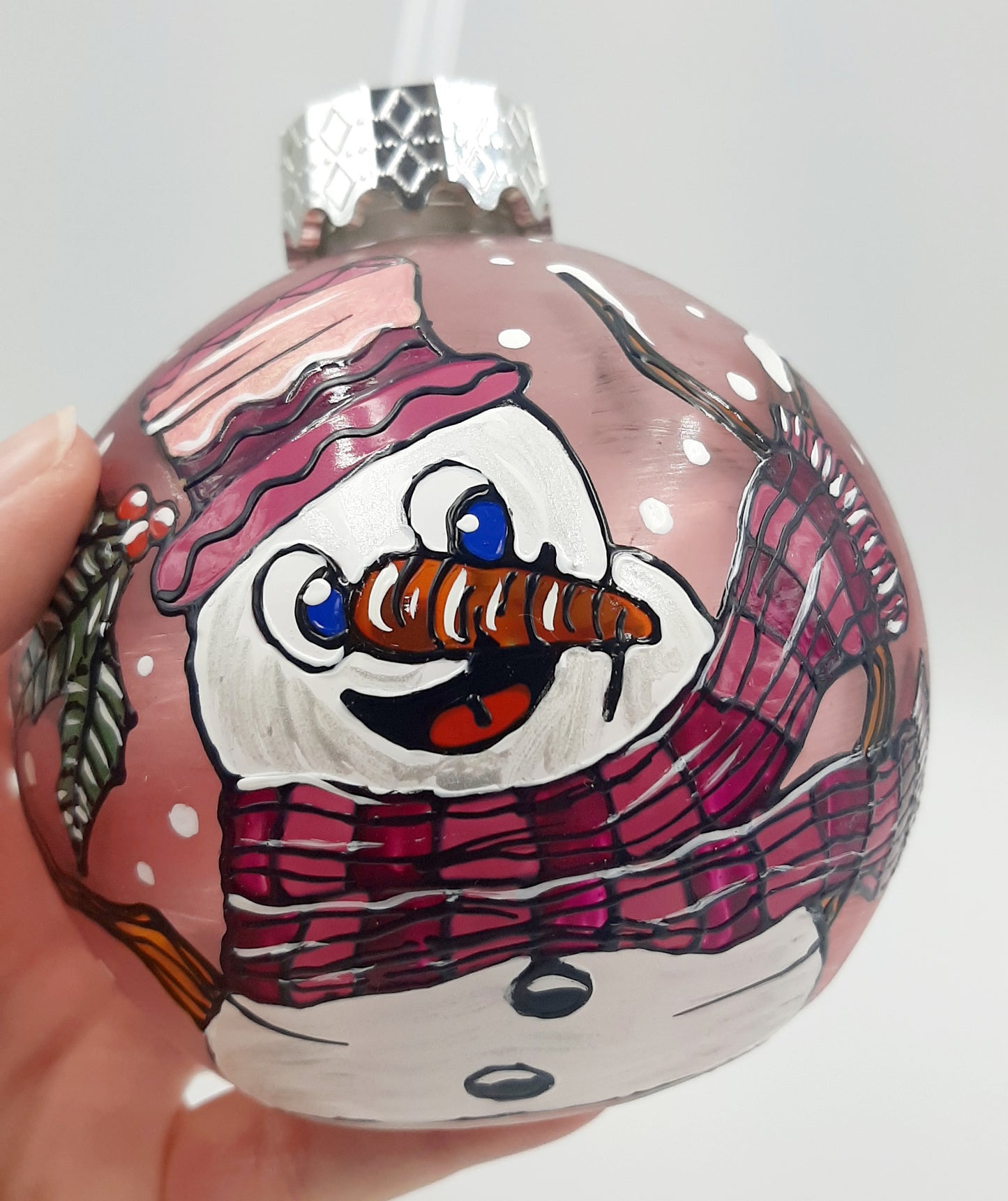 Boule cocktail bonhomme de neige sur fond rose