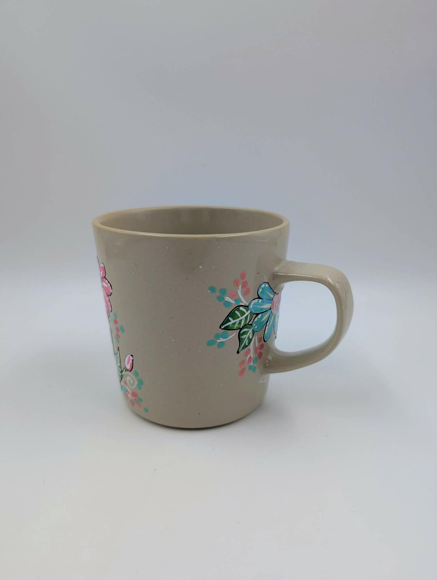 Tasse marguerites roses et turquoises