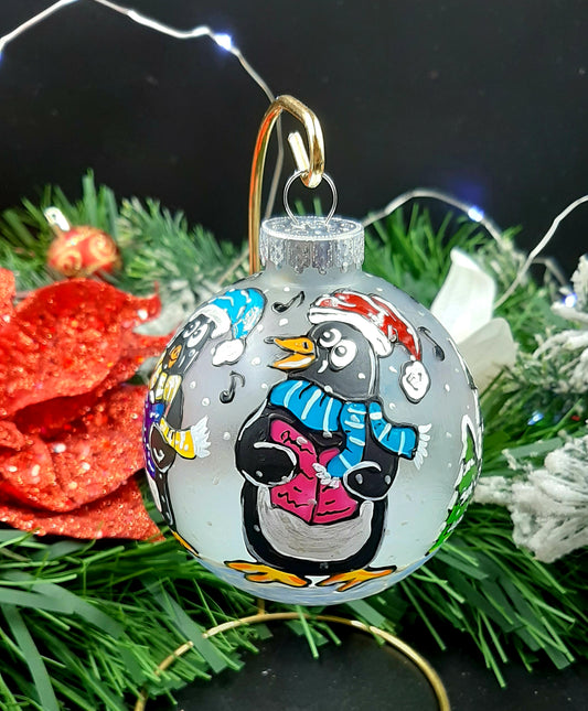 Boule de Noël chorale de pingouins